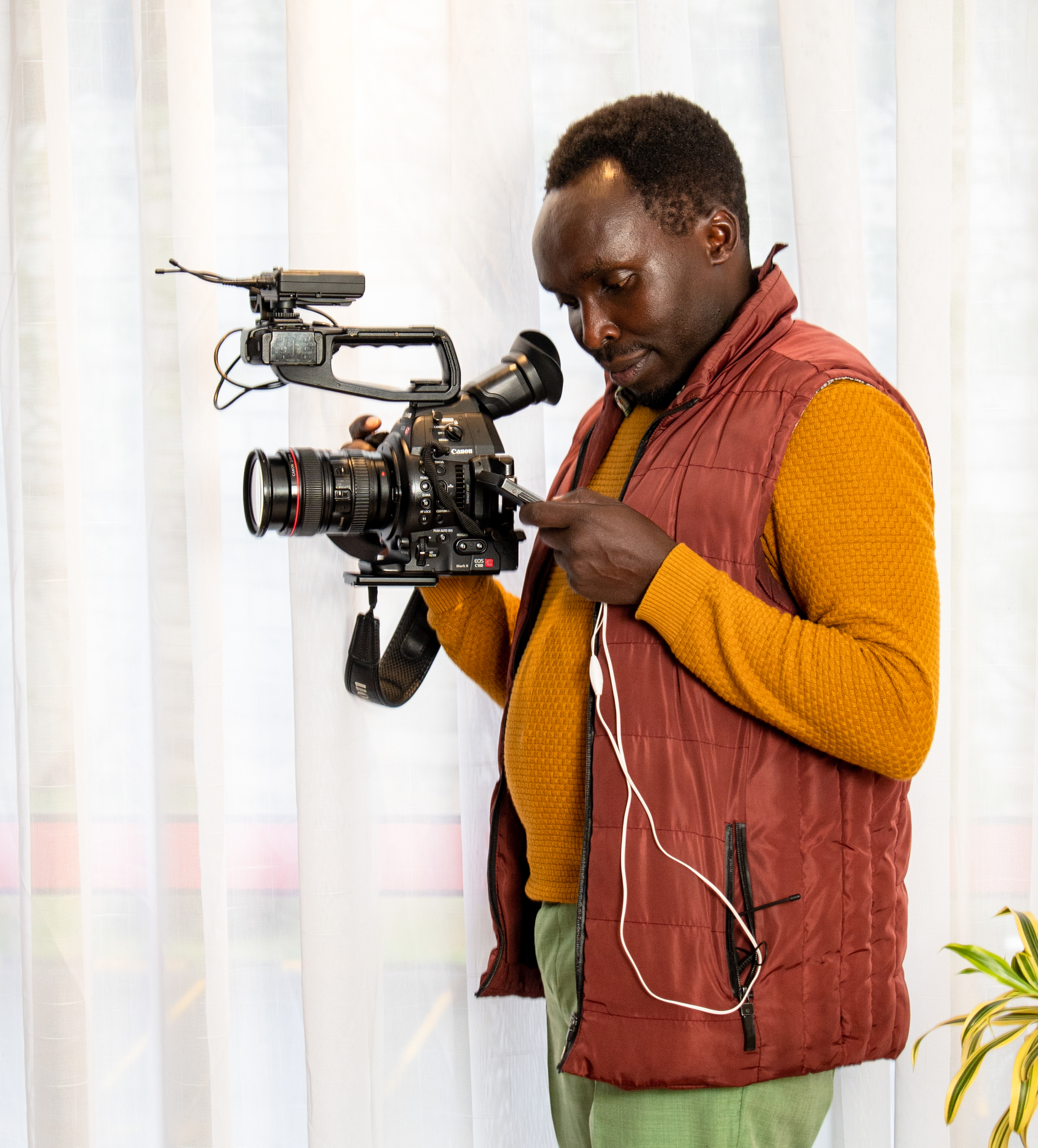 Cheptiony Doing Videography services for a client